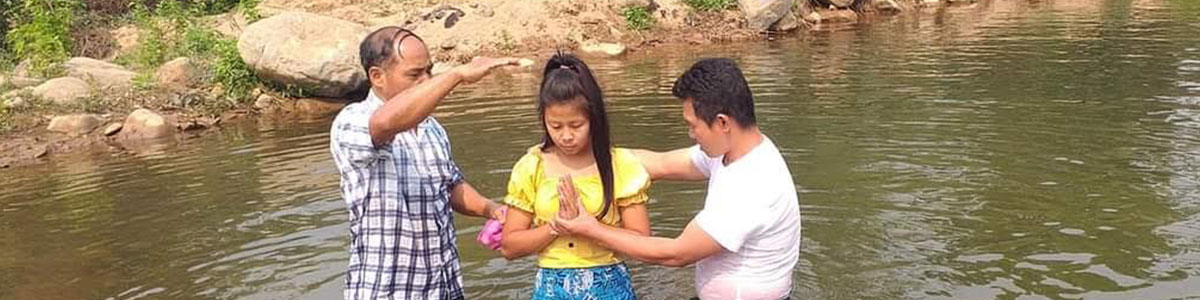 Woman being baptized cropped